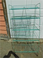 Another vintage metal wire rack with no sign.