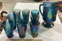 Carnival glass pitcher w/ 9 glasses