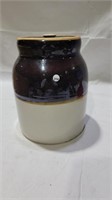 Brown and white crock with lid