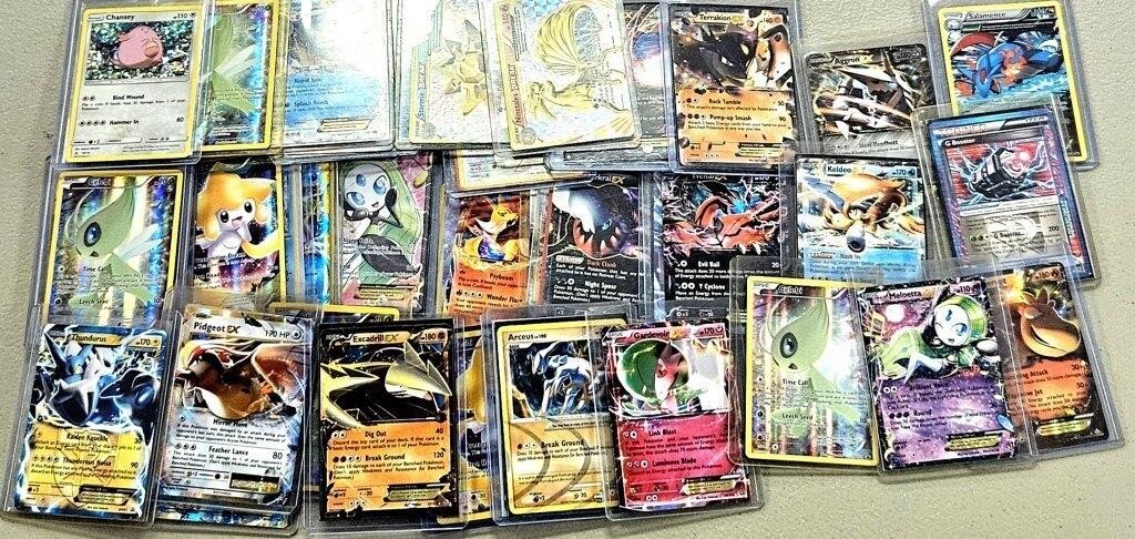 46 Pokemon Cards in Top Loaders