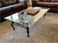 Beveled glass top coffee table with decorative