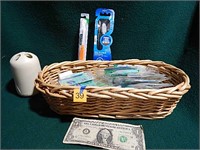 Oblong Basket Full of Various Teeth Care Items