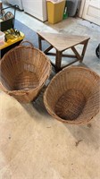 Two large antique laundry baskets, and one corner