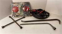 Magnetic trailer light kit, jump cables, pry bar