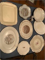 Old china platters and plates with chips and