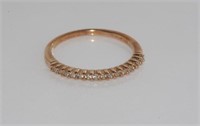 Rose gold and diamond stacker ring marked 9K