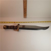 Bowie knife with brass hand guard