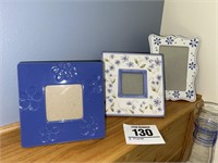 Blue w/ white floral ceramic picture frames (3)...