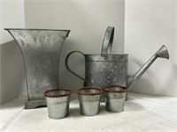 4 Tin Planters With A Watering Can