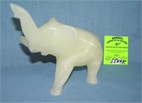 Alabaster elephant with upraised trunk