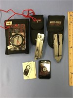 Leatherman knives and a compass         (k 18)