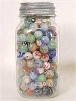 Mason jar of vintage marbles