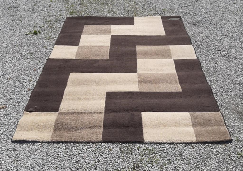 Large brown, beige, & coffee coloured rug