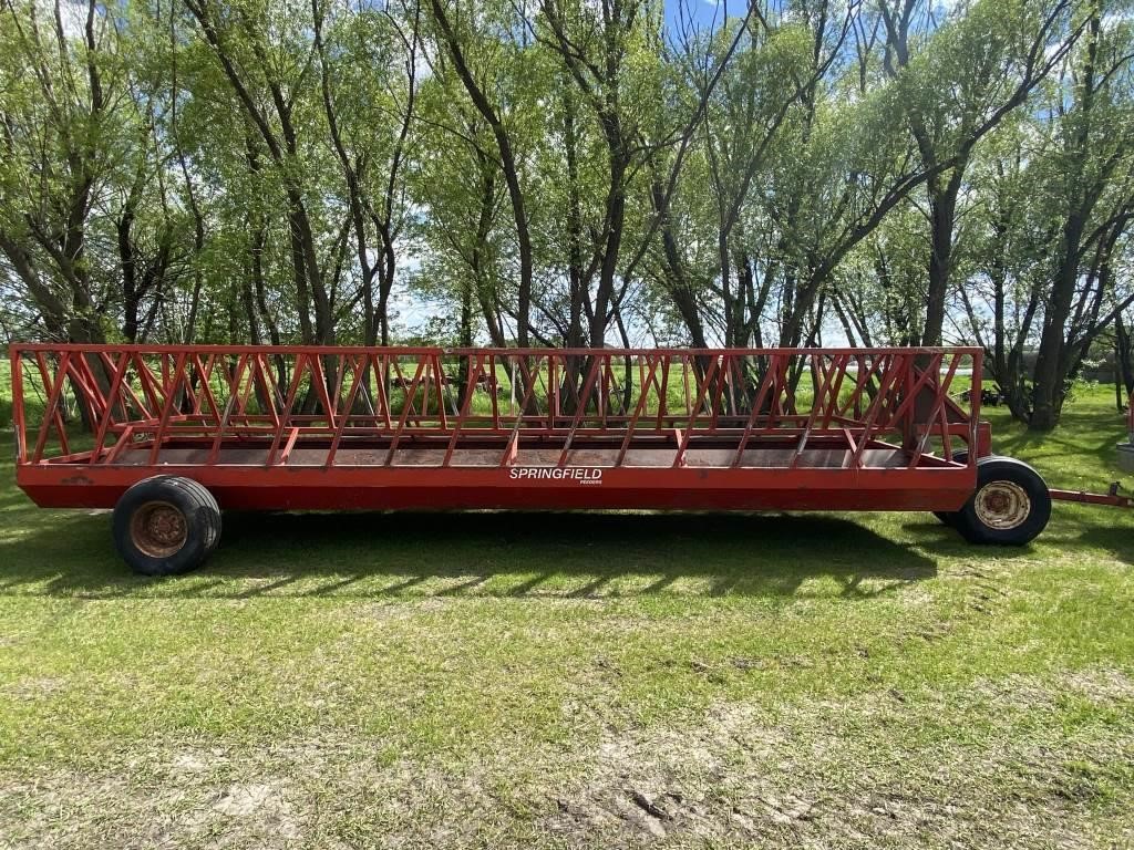 24' feeder wagon, can feed silage or bales in it.