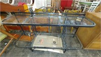 metal console with glass shelves