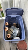 Tub full of grill supplies and decor