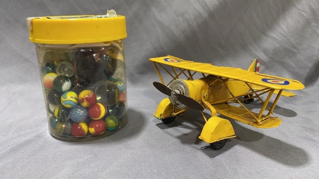 Press Metal plane & Marbles