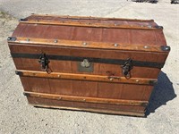 ANTIQUE LEATHER ADORNED TRUNK