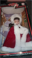 HOLIDAY MOMENTS GENUINE PORCELAIN DOLL