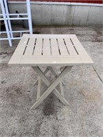 Small plastic folding patio table