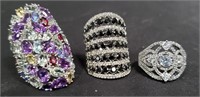 Group of sterling silver rings with colored