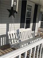 Wooden porch swing