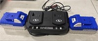 Snow Joe 24 Volt Dual Charger and 2 Batteries