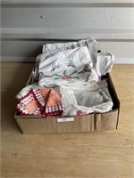 Box of embroidered pillow cases & hot pads