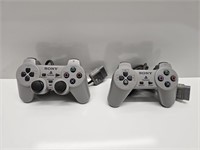 PLAYSTATION PS1 GREY CONTROLLERS (2)