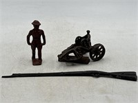 Vintage red cast iron soldier cast iron tractor