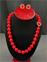 Vintage red color necklace with matching earrings.