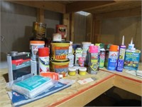 assorted garage items glues strip fast misc