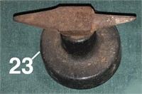 Small double ended jeweler's? anvil on iron base