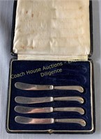 (4) Butter knives with sterling silver handles