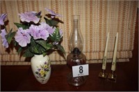 Glass kerosene lamp, brass candlesticks, and vase