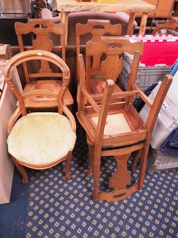 Set of four oak chairs with shield backs; plus