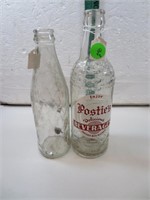 2 Beverage Bottles: Postie's Delicious Beverages
