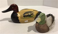 Duck decoys - one carved out of solid wood the