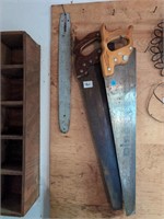 2 handsaws 1 is Disston and metal piece
