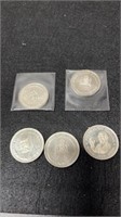 Five 1975 Joe Howe Dollar Coins