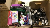 Box lot of kids toys and a Uniden telephone set