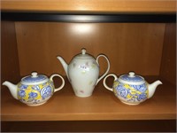 Trio of porcelain tea pots