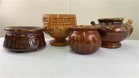 Brown glazed pottery pieces (4)