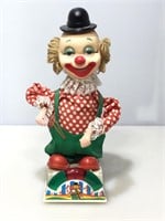 Vintage moving clown figure on stand. Untested.