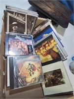 Flat of music c d's including some rock and roll
