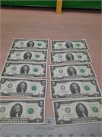 10- sequential 2 dollar bills