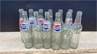 12 Vintage Glass Pop Bottles. NO SHIPPING