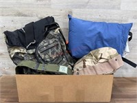 box of camping and hunting items