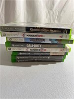 Stack of Xbox one and 360 games