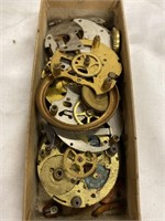 Box of pocket watch parts